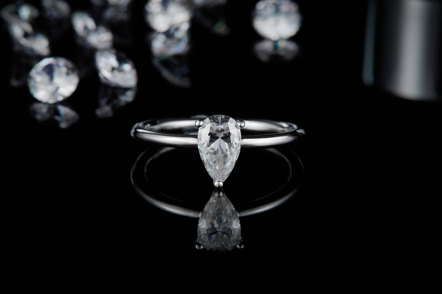 1ct Pear-shaped Solitaire Moissanite Ring in Sterling Silver with White Gold Plating